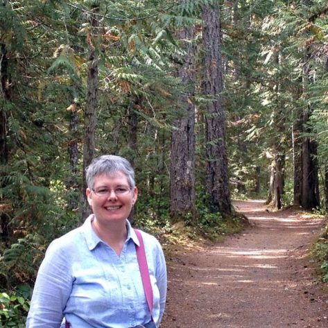 Dee Kerdor walking a forest path, reflecting on retirement and gentle exploration